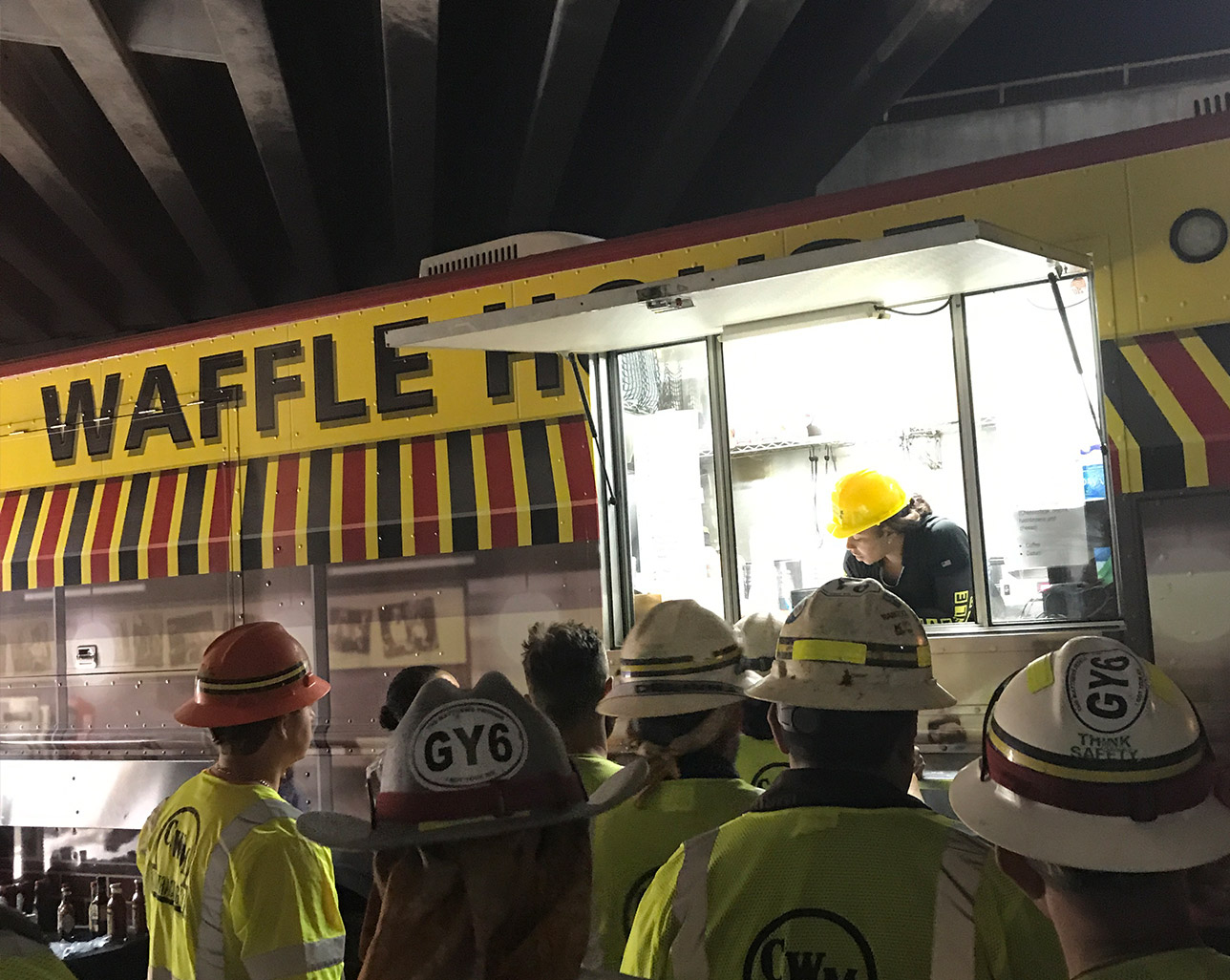 customers lined up at Waffle House food truck